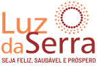 Logo com um desenho de um sol e as palavras Luz da Serra e Seja feliz, saudável e próspero